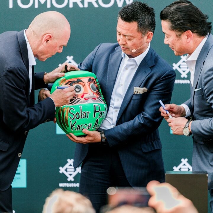 Painting the last eye of the commemorative Daruma doll at the inauguration of Kassø e-methanol facility. Present is the CEO of European Energy and representatives of Mitsui.