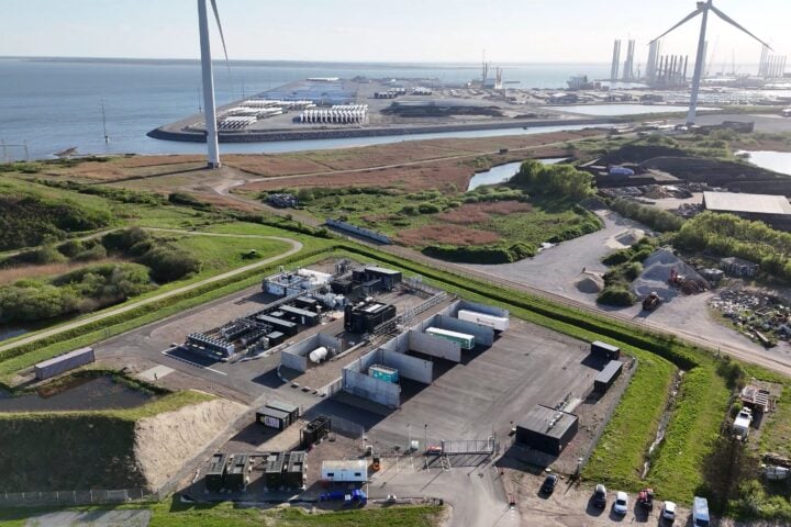 Drone photo of Måde Energy Park, Denmark, showing hydrogen facility, wind turbines, and battery storage